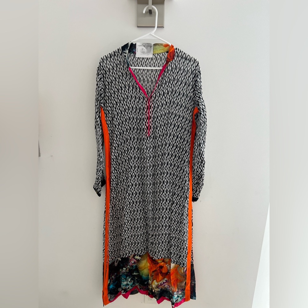Stylish Black and White Patterned Kurti with Orange Accents